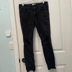 Black ripped skinny jeans - mid rise